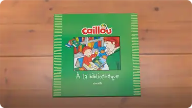 Caillou à la bibliothèque book